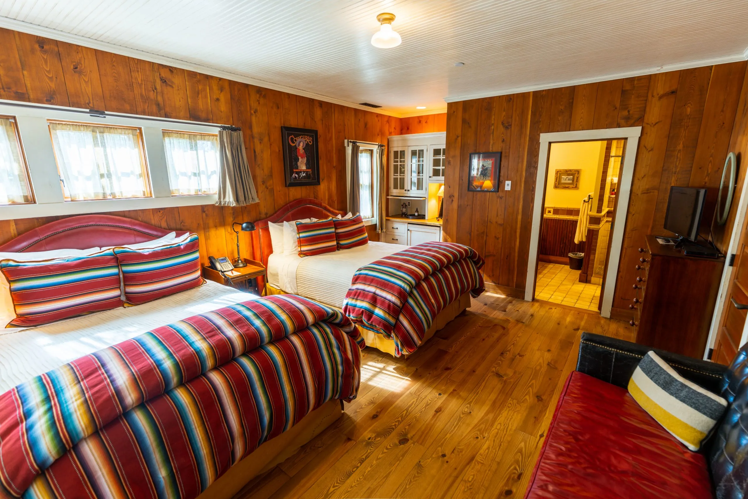 Cabin bedroom with two double beds