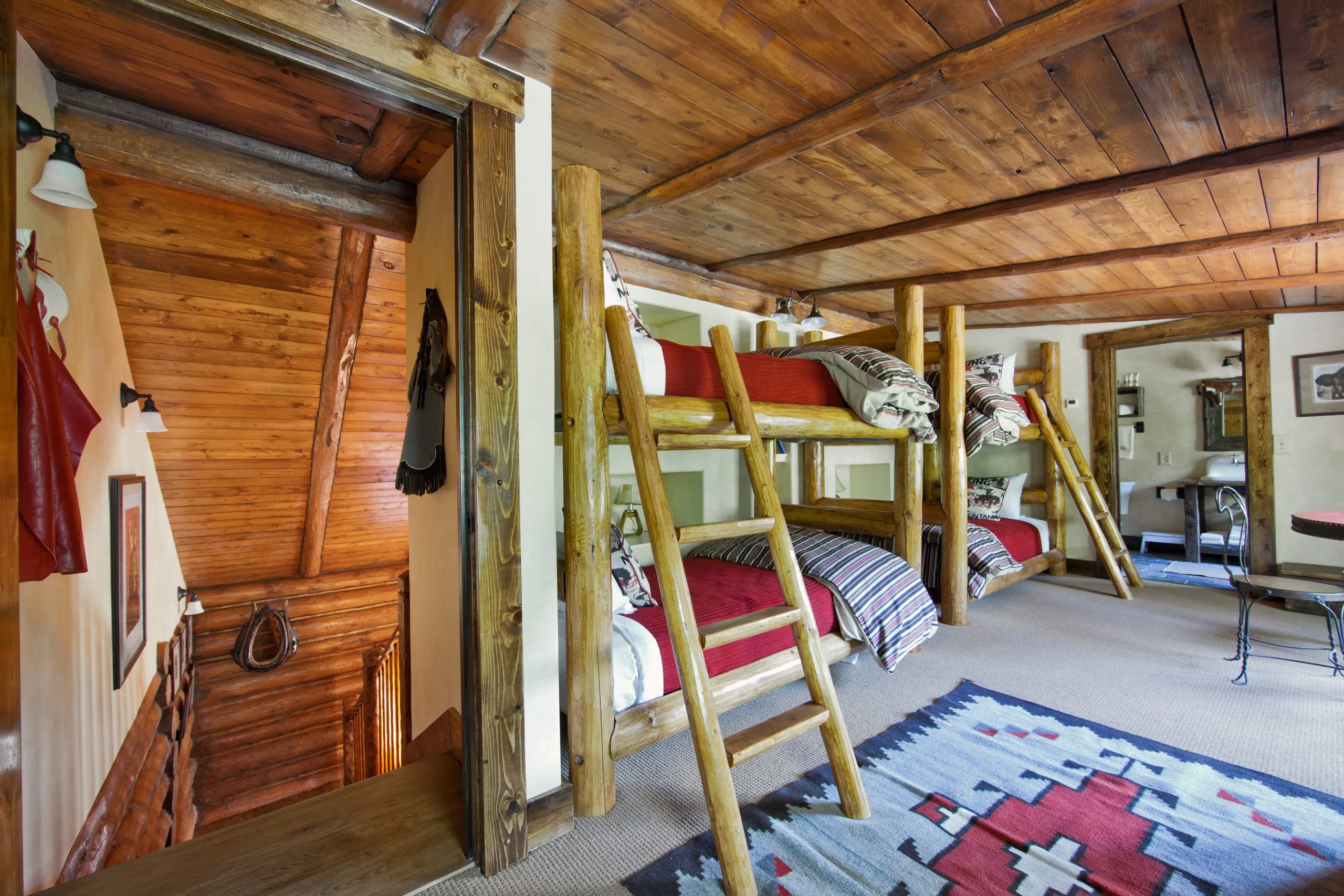 Two bunkbeds inside a cabin