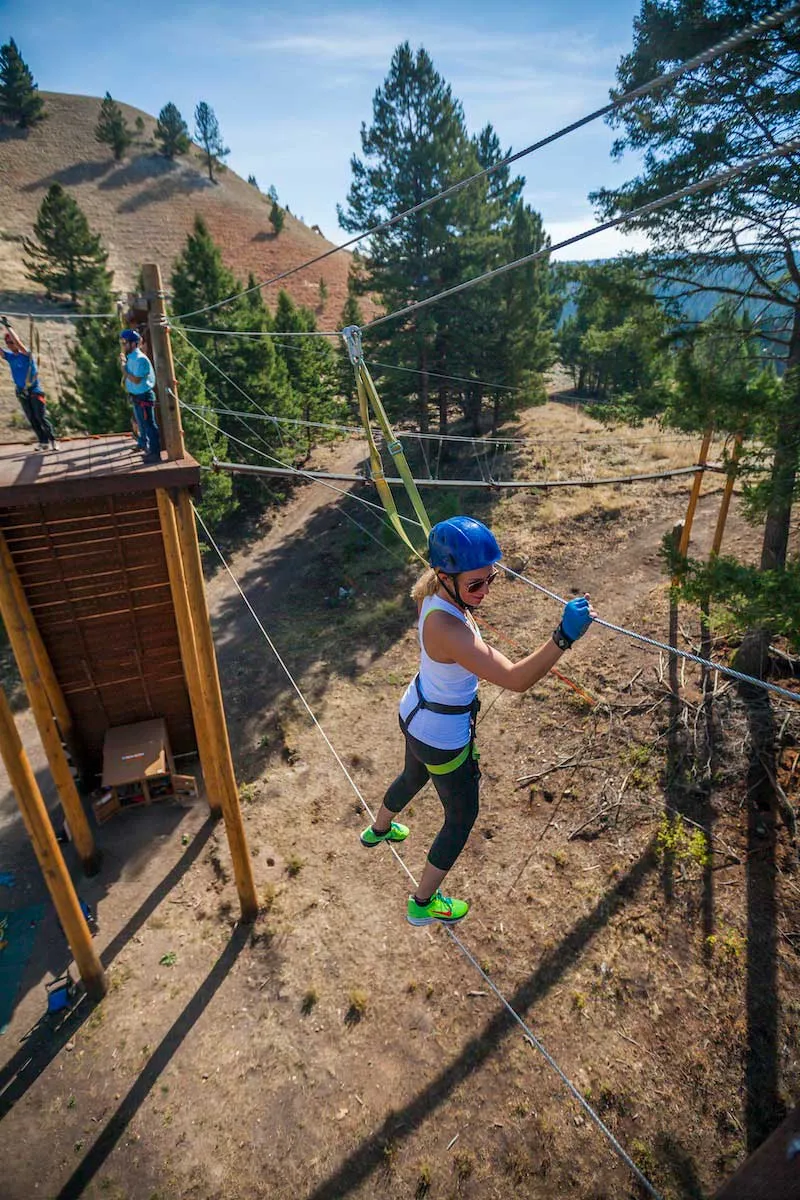 Woman in ropes course