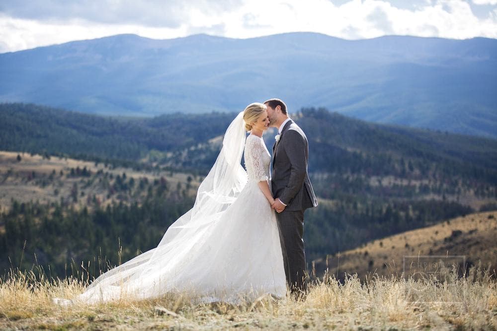 Married couple on a mountain at The Ranch at Rock Creek