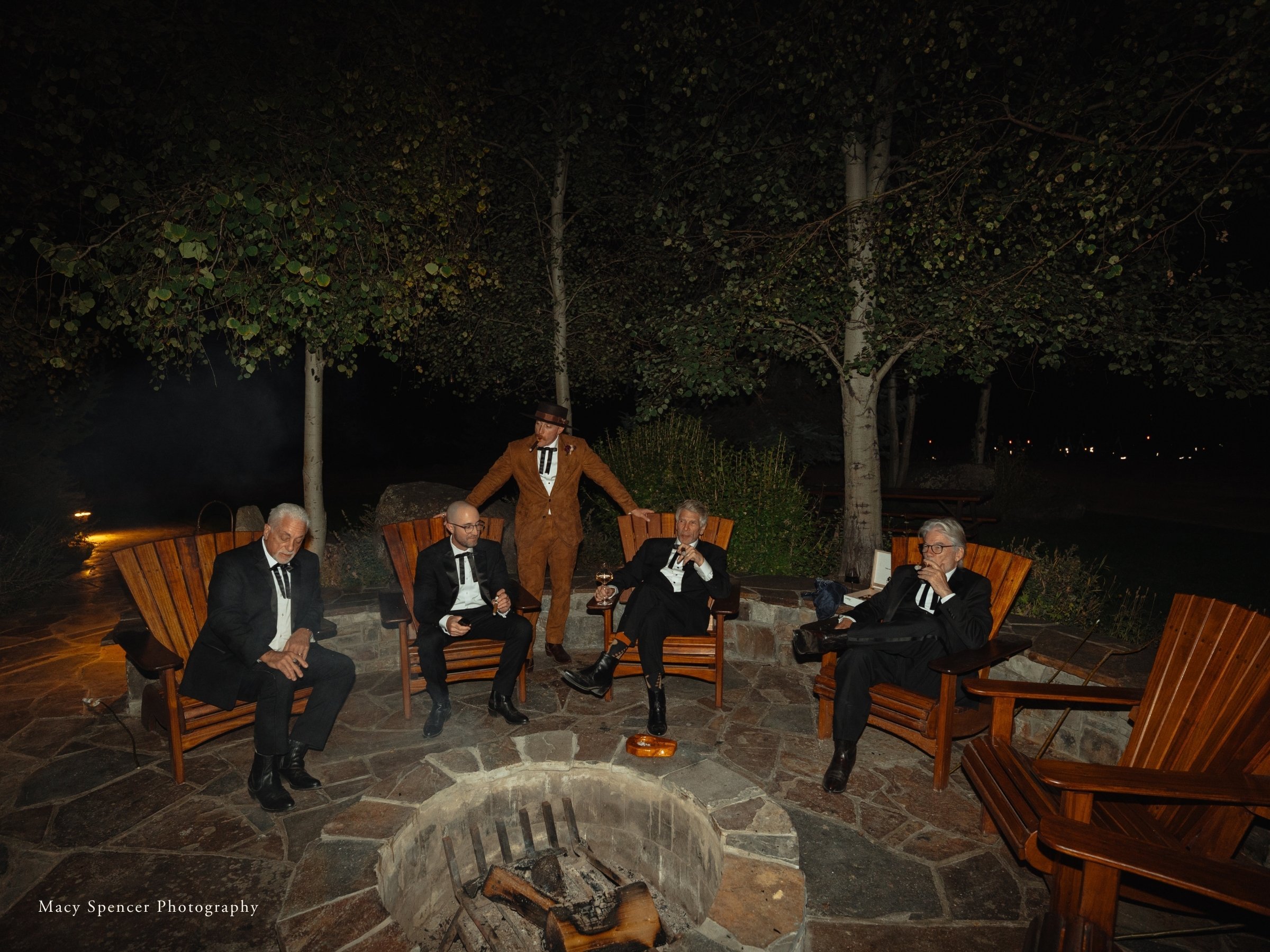 Groom and bachelor party enjoying the Granite Lodge Flagstone fire pit